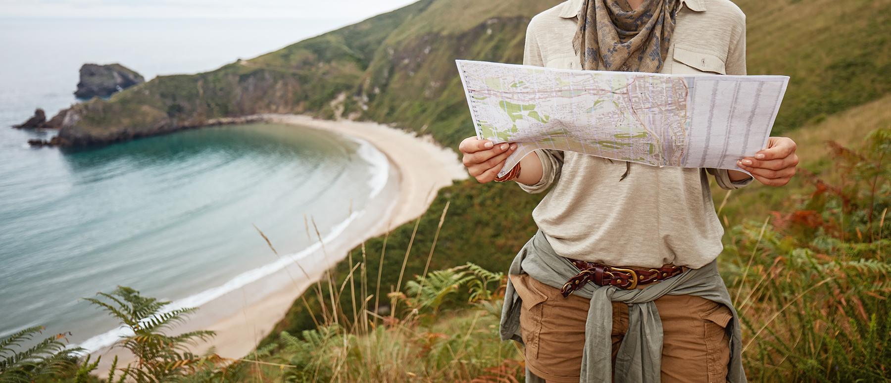 A woman holding a map.